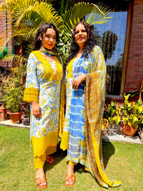 White Muslin Yellow Italian Lace Stitched Suit Set